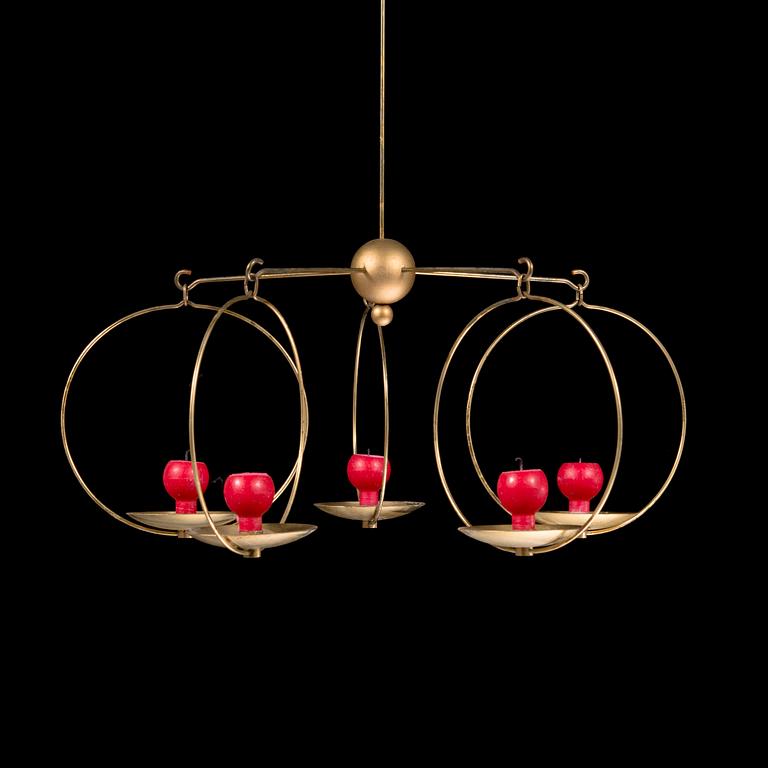 Kaija Aarikka, A candle-mobile "The Iltatulet candelabrum" in brass, design 1968.