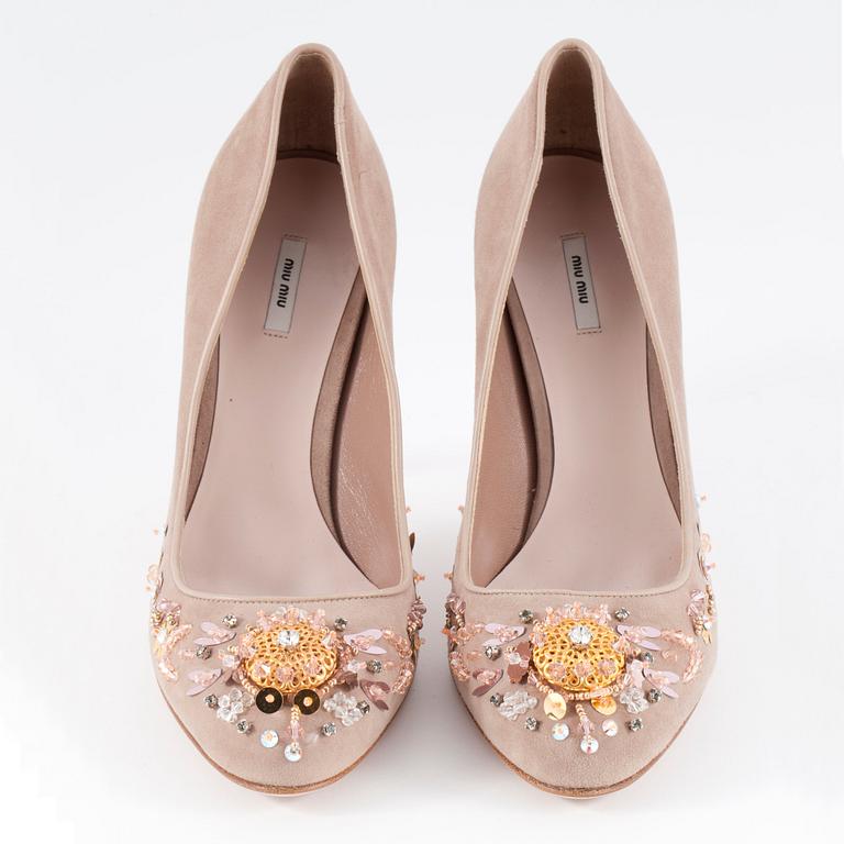 MIU MIU, a pair of beige suede pumps with sequined embellishment, size 39.
