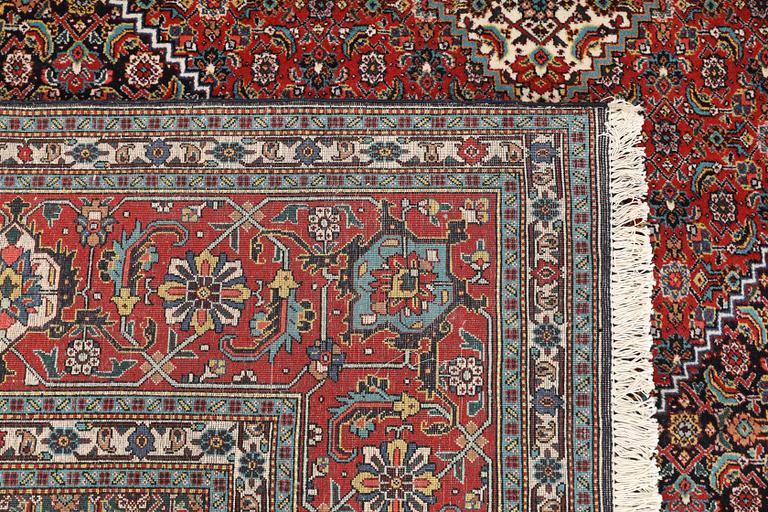 A carpet, Tabriz, c. 40 raj, c. 390 x 298 cm.