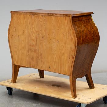 A mid 20th century rococo style chest of three drawers.