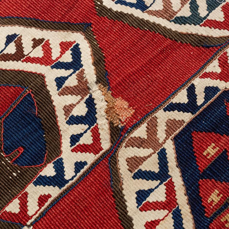 Carpet, probably an Anatolian Kelim, antique, two panels, each c. 380-390 x 87-102 cm.