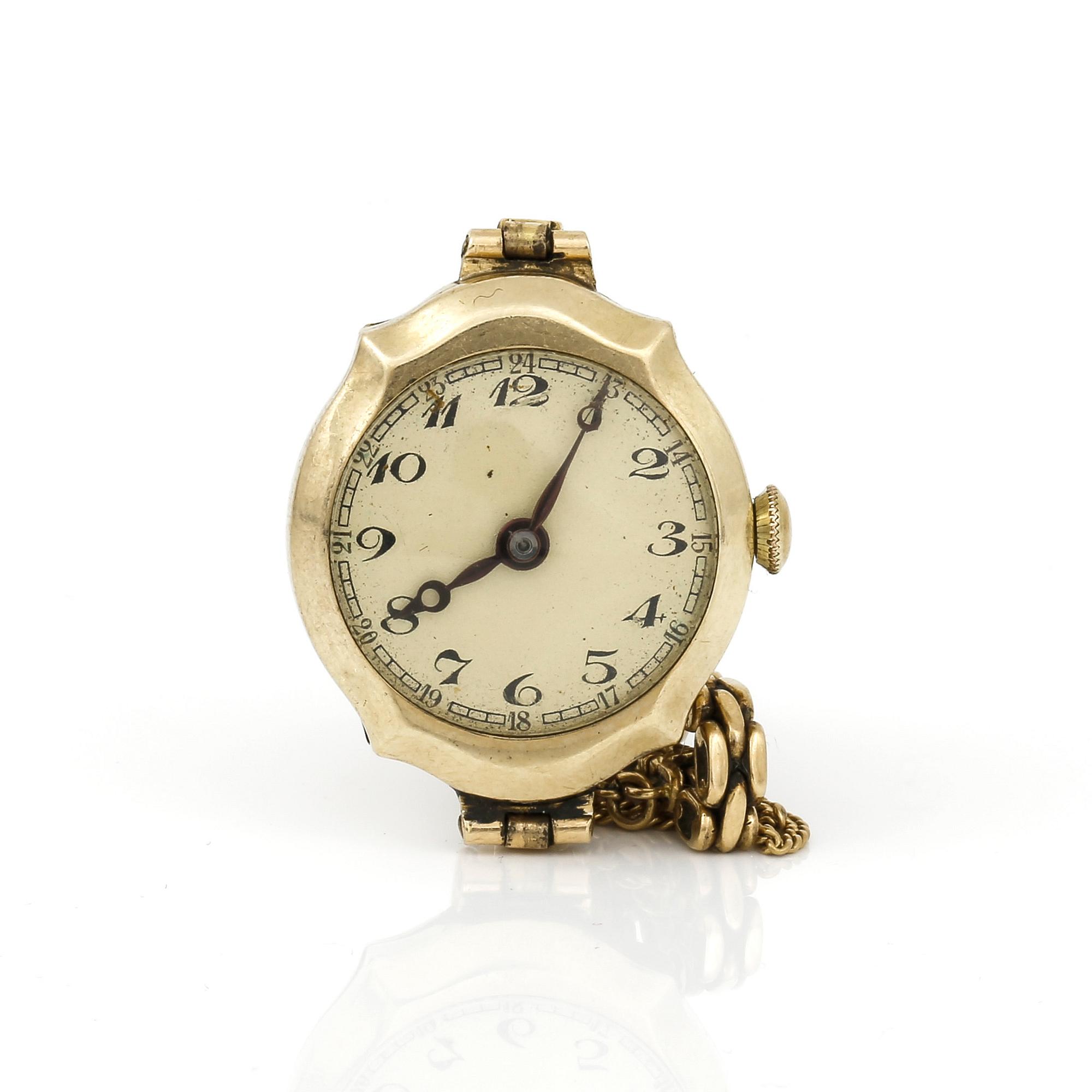 DAMARMBANDSUR, manuell, 14K guld med länk i 18K guld. total vikt ca 19g.