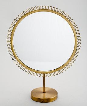 BORDSSPEGEL, mässing, möjligen NK (Nordiska Kompaniet).
OBS! TEXTÄNDRING.