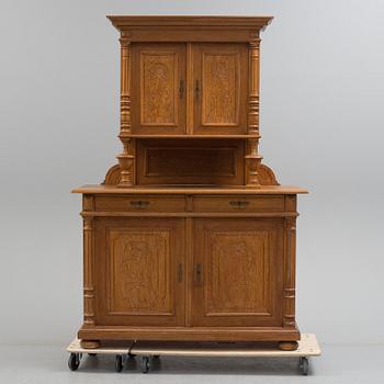 A circa 1900 oak cabinet.