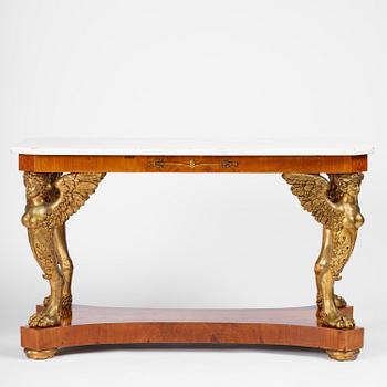 A presumably Austrian Empire centre table, early 19th century.