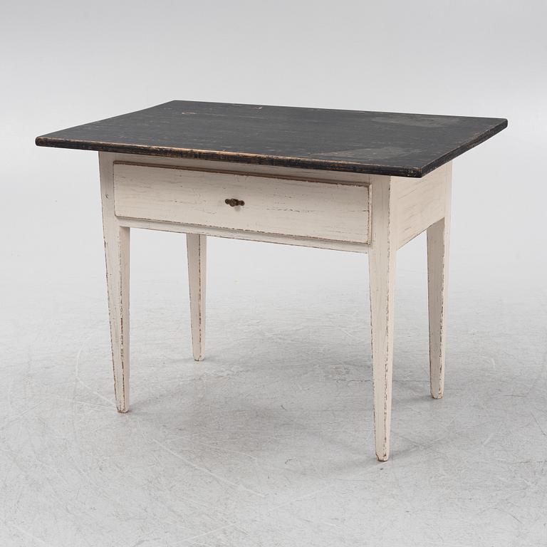 A painted table, 19th Century.
