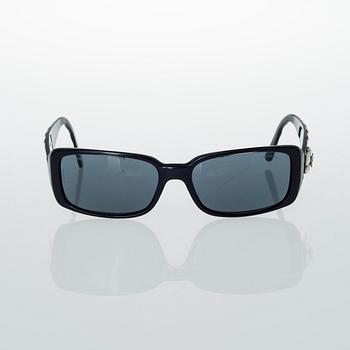 AURINKOLASIT, Chanel.