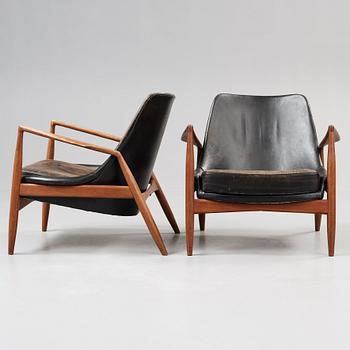 A pair of Olof Persson 'Seal' teak and black leather easy chairs, Olof Persson Möbler, Jönköping 1950's-60's.