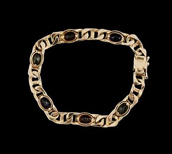 ARMBAND, 14k guld med peridoter, citriner och ametister. Ca 17 g.