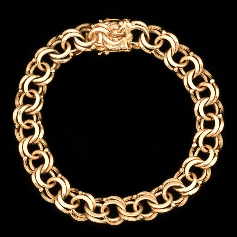 ARMLÄNK, 18 k guld. Vikt ca 36 g.