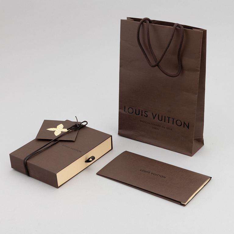Louis Vuitton, a black Monogram Empreinte leather 'Curieuse' wallet, 2015.