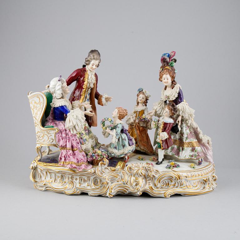 A Rococo style porcelain figurine group, Rudolstadt Volkstedt, Germany, early 20th Century.