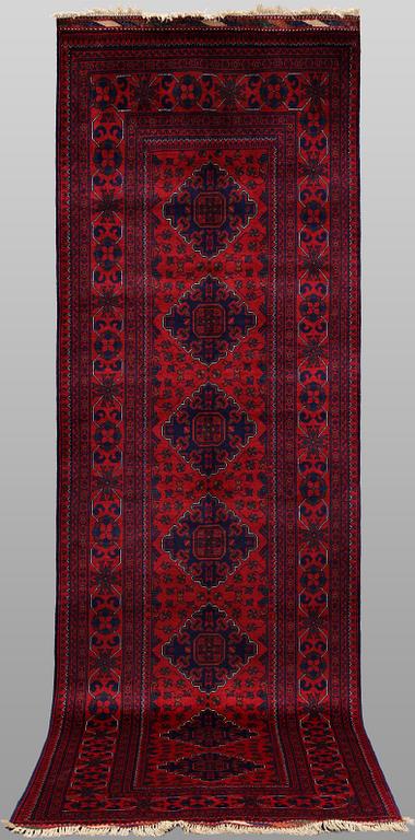 A Afghan runner carpet, 280 x 92 cm.