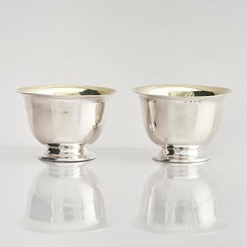 A pair of Swedish parcel-gilt silver dessert bowls with stand, mark of Gustaf Möllenborg, Stockholm 1830.