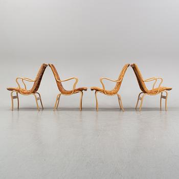 Four 'Eva' lounge chairs by Bruno Mathsson, for Firma Karl Mathsson, 1960' and 70's.