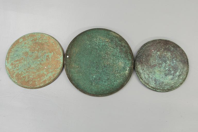 A set of three South East Asian copper alloy trays, 19th Century or older. Java.