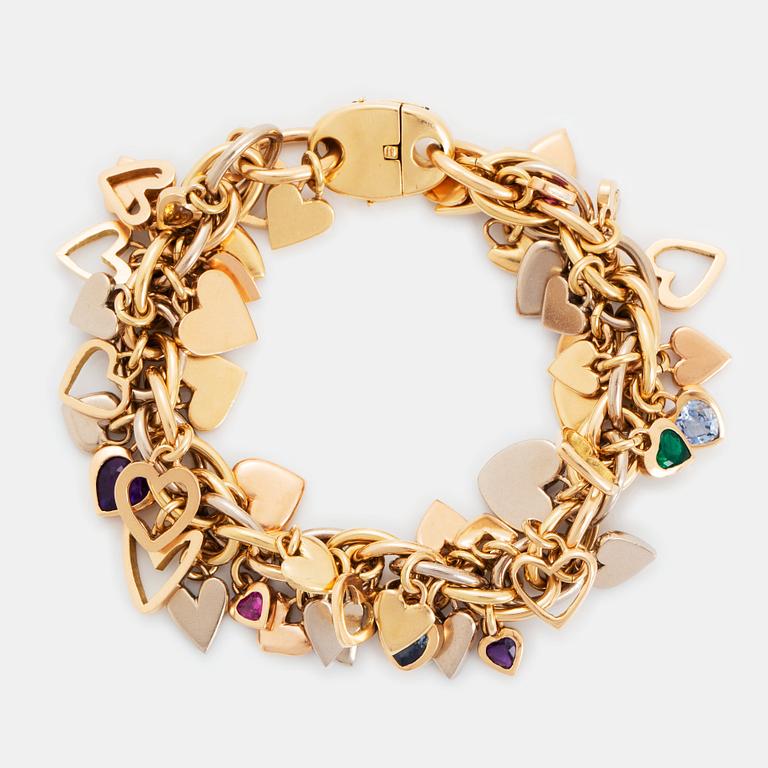 An 18K gold Gaudy bracelet with heart shaped charms.