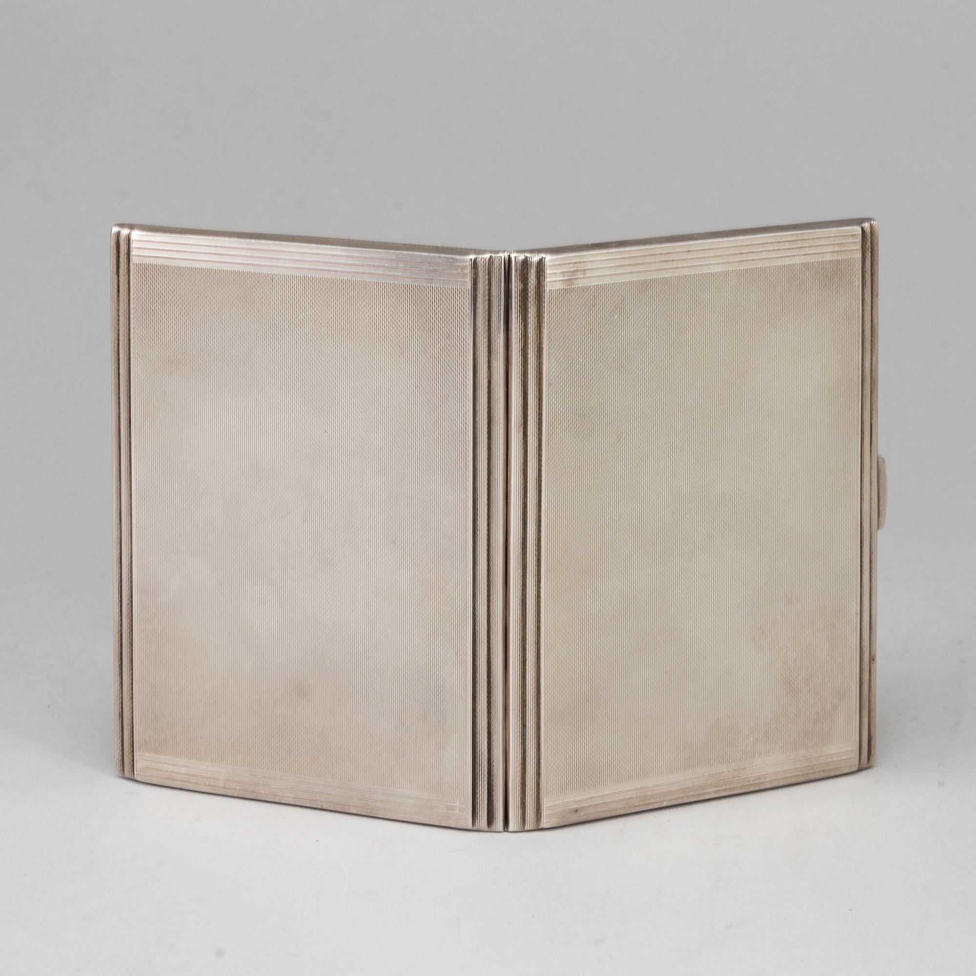 A sterling silver cigarette-case, made in 1935 by Dingley (or Davies)  Brothers, Birmingham, England