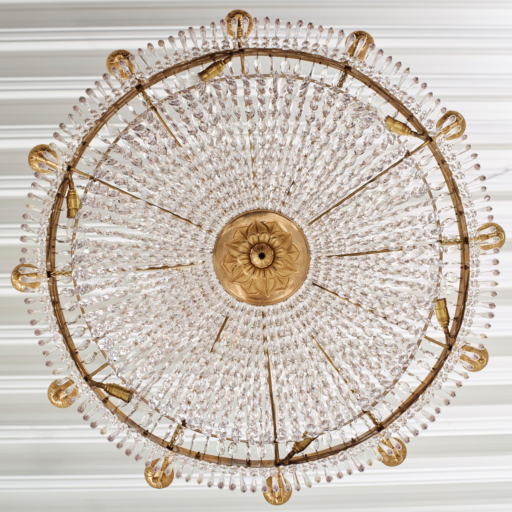 An Empire twelve-light chandelier, early 19th century.