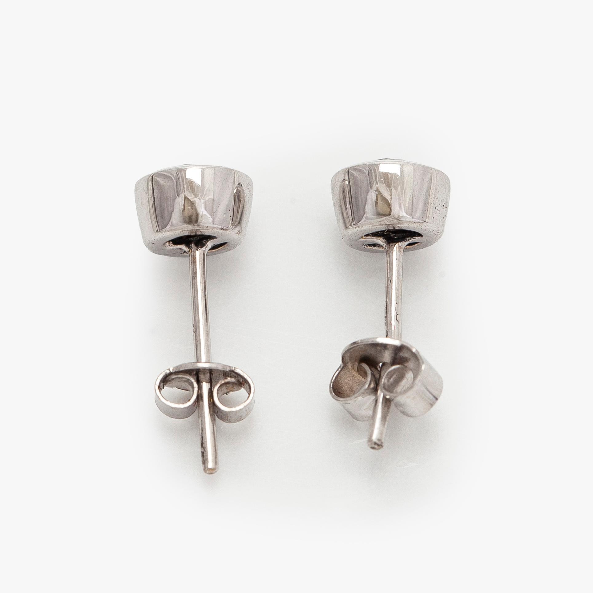 Earrings, brilliant-cut diamonds totalling circa 0.60 ct, 14K white gold.