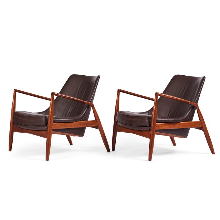 Ib Kofod-Larsen, a pair of "Sälen" dark brown leather chairs, Olof Perssons Fåtöljindustri (OPE), Jönköping.