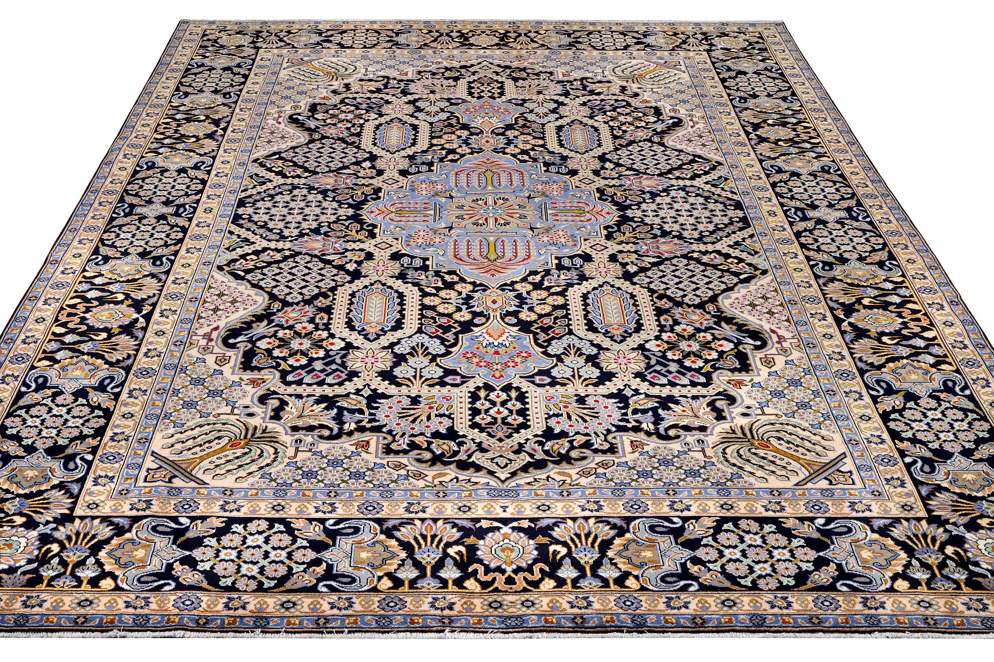 A Kashan carpet, c. 407 x 285 cm.