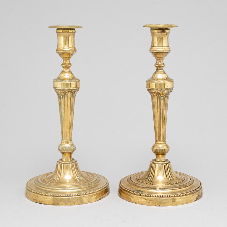 A pair of late 18th century candlesticks.