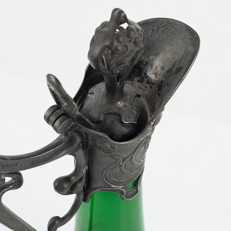 A silver plate and glass decanter, Art Nouveau, early 20th century.