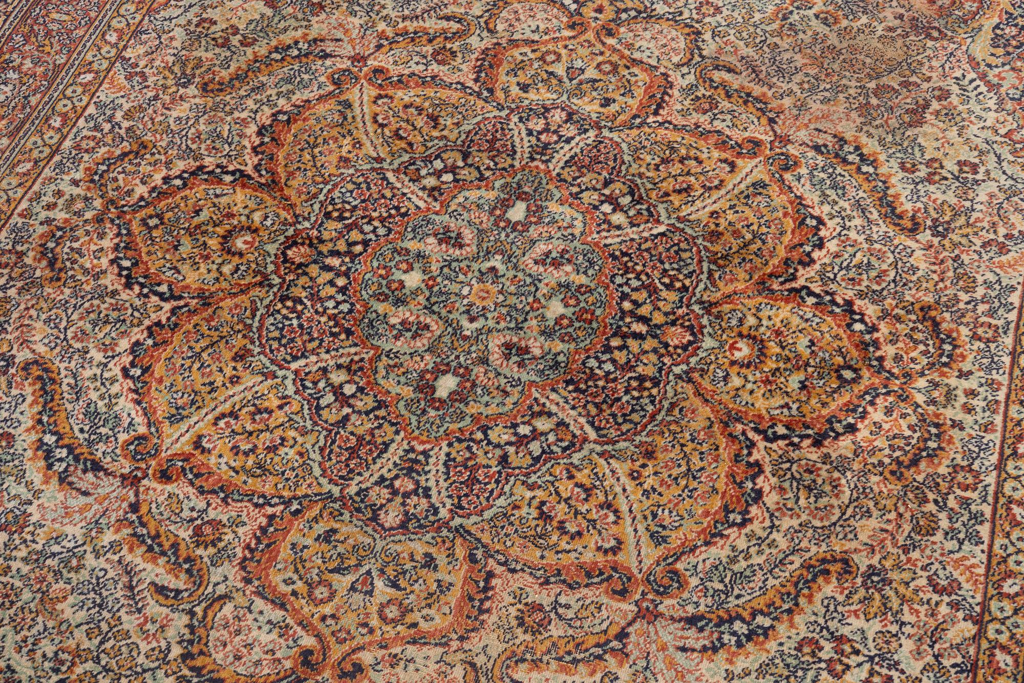 A semi-antique oriental carpet, c. 290 x 195 cm.