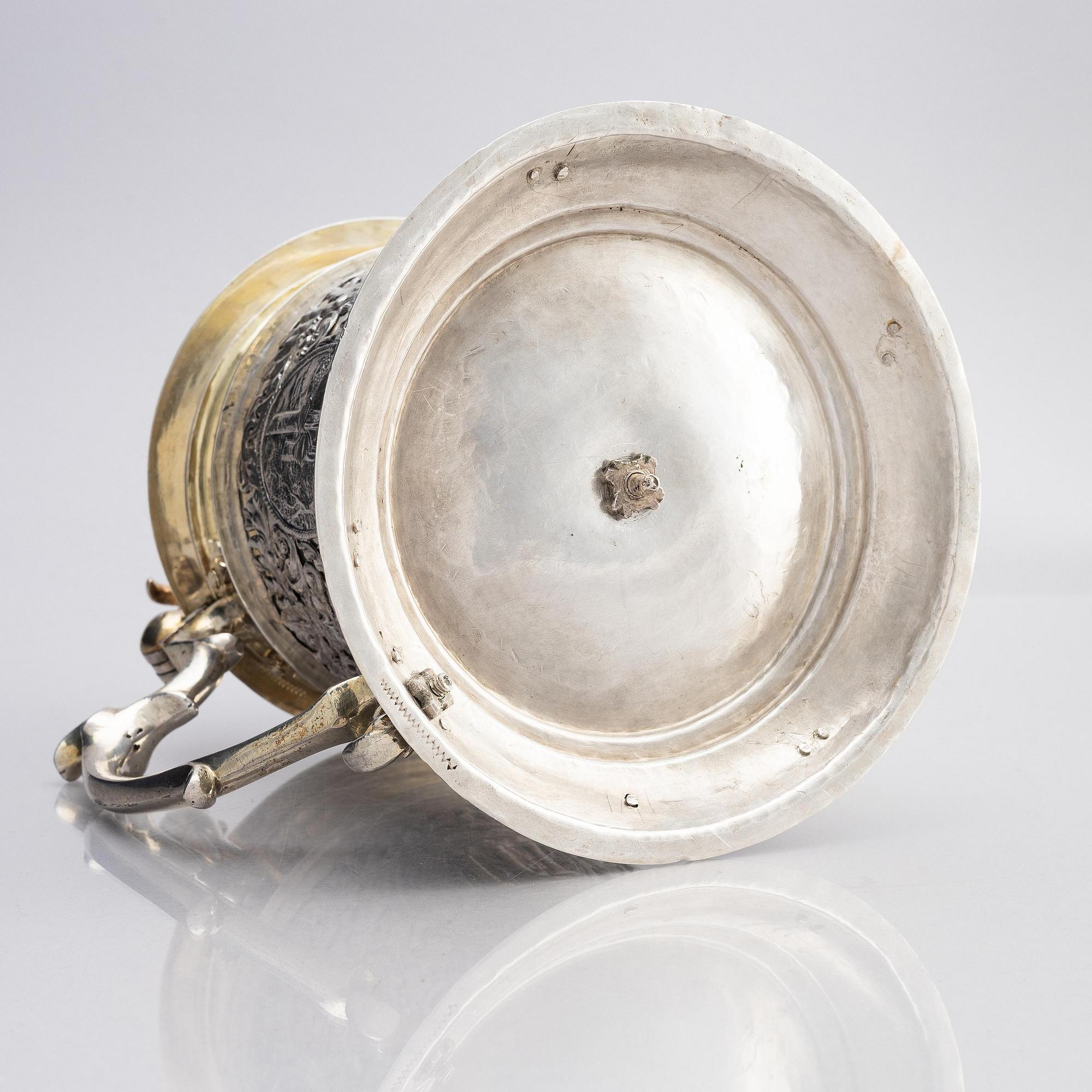 An Augsburg parcel-gilt silver tankard, mark of Daniel Schwestermüller, Augsburg 1685-87.