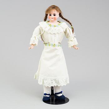 a German porcelain doll from the early 20th century.