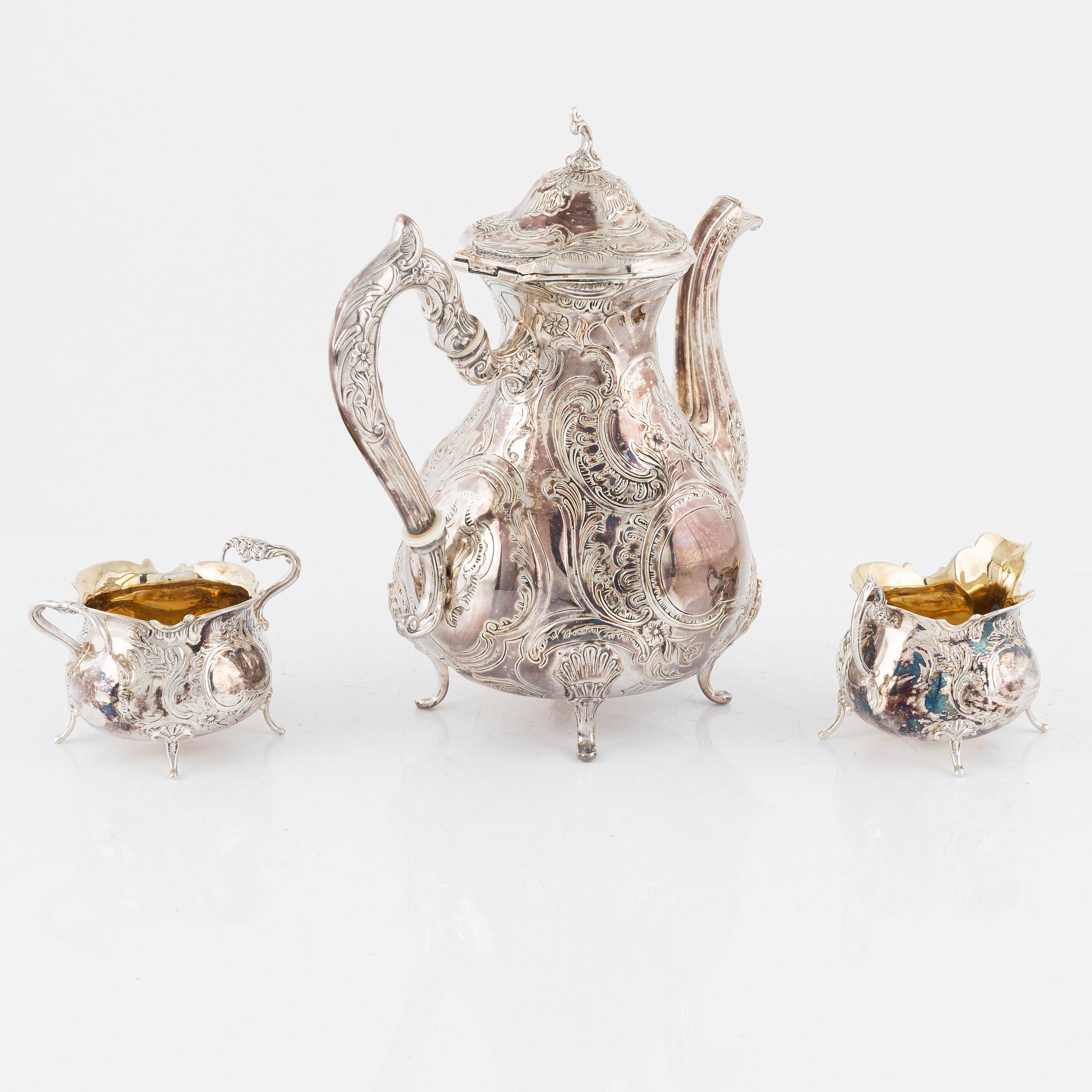 A Swedish Silver Coffee Pot, Creamer and Sugar Bowl, mark of Gewe Silvervarufabriken, Malmö 1971-73.