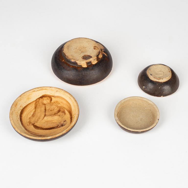 A group of brown glazed South East Asian potteries, 14th/17th Century.