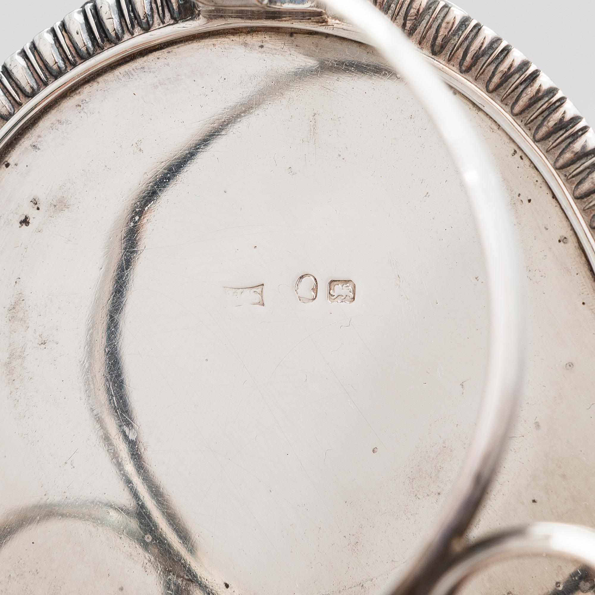 Glass and sterling silver cruet stand, maker's marks of Samuel Hennell and Robert Hennell III, London 1811 and 1879.