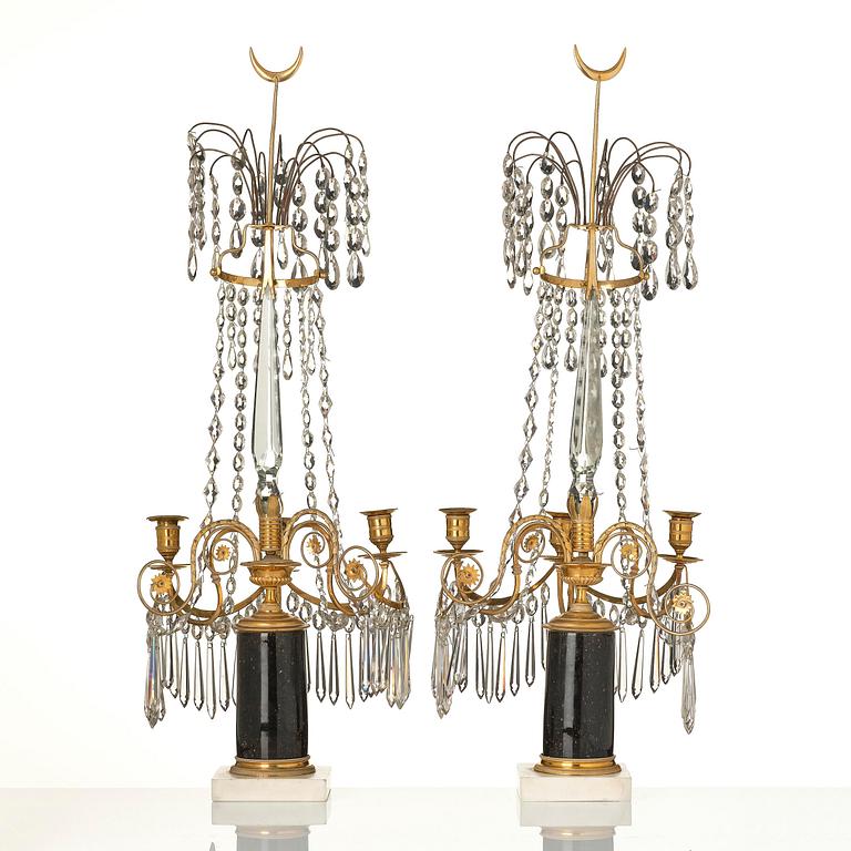 A pair of late Gustavian ormolu and marble three-light candelabra, Stockholm, late 18th century.