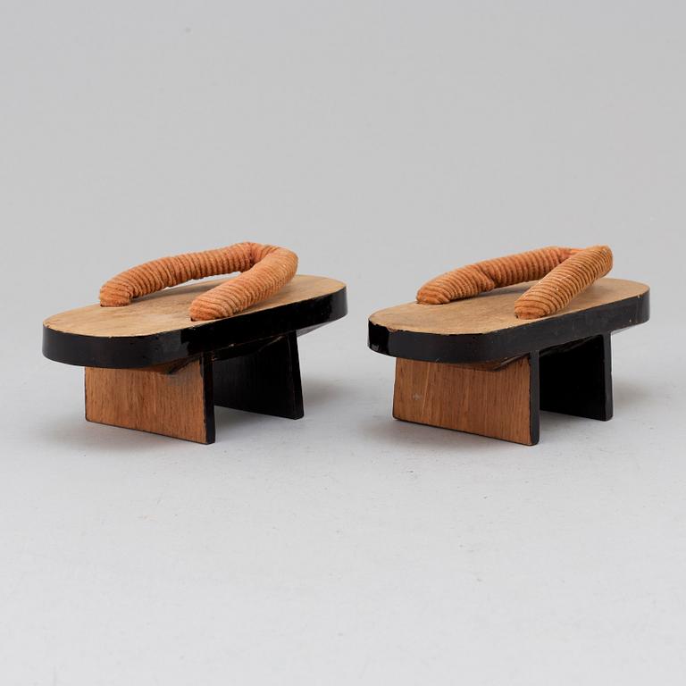 A pair of Japanese 'Geta' shows and two Chinese pouches, early 20th century.