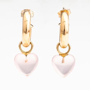 A pair of 14K gold earrings with rose quartz and plastic pendants.