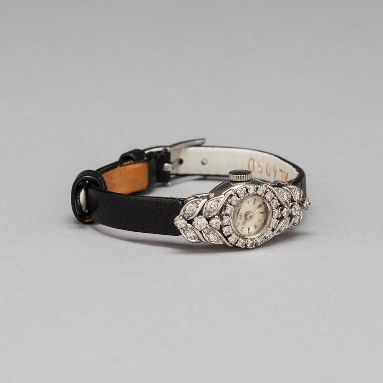 DAMARMBANDSUR, Ebel. Besatt med åttkantslipade diamanter, tot ca 0.60 ct.