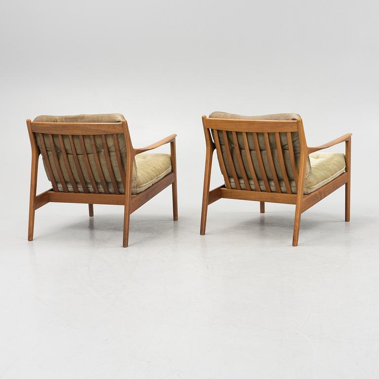 Folke Ohlsson, a pair of 'USA 75' armchairs, Dux, 1960's.