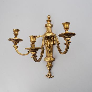 A pair of gilt bronze Louis XVI style wall lights. Late 19th century. 80.