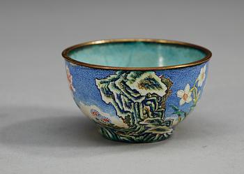 A finely enammeled cup, Qing dynasty with Qianlong four character mark.