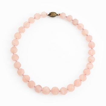 Necklace, with carved rose quartz and clasp silver, Asia.