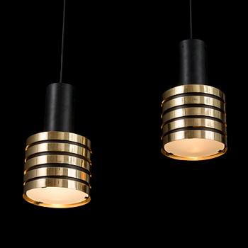 A pair of mid 20th century 'K2-49' pendant light for Taito, Finland.