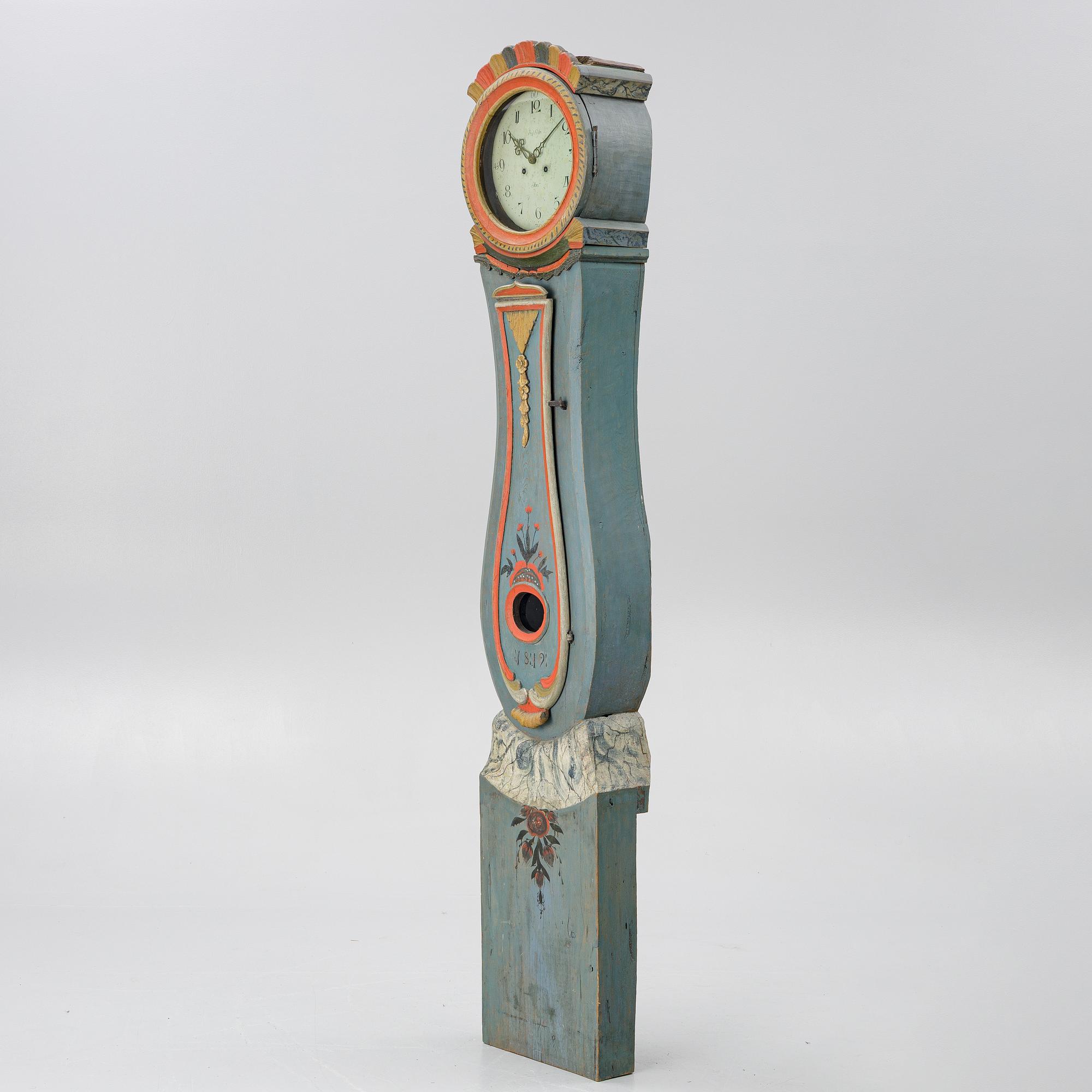 A Swedish folk art longcase clock from Hälsingland, dated 1812.