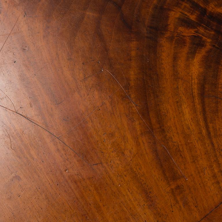 An early 20th century late Gustavian mahogany veneered table.