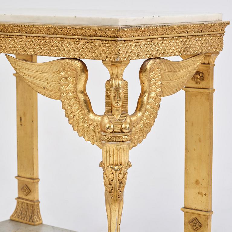 A late Gustavian giltwood console in the manner of J. Frisk, Stockholm, early 19th century.