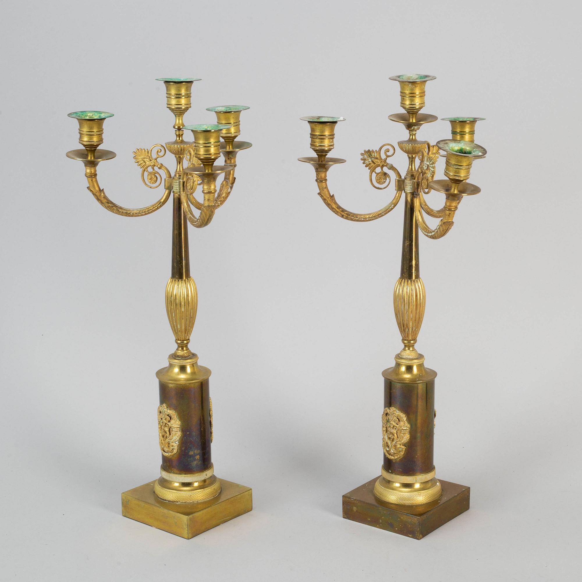 A pair of empire style candelabra, first half of the 20th century.