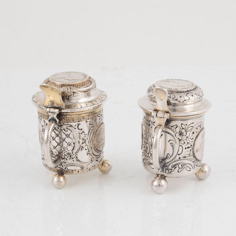 Candlesticks, a pair, Gustaf Möllenborg, Stockholm 1844, and two salt cellars including CG Hallberg, Stockholm 1897.