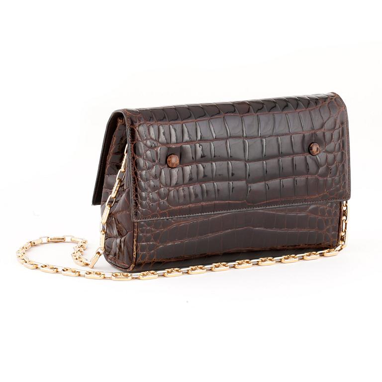 CÉLINE, a brown crocodile evening bag / shoulder bag with  shoulder strap.