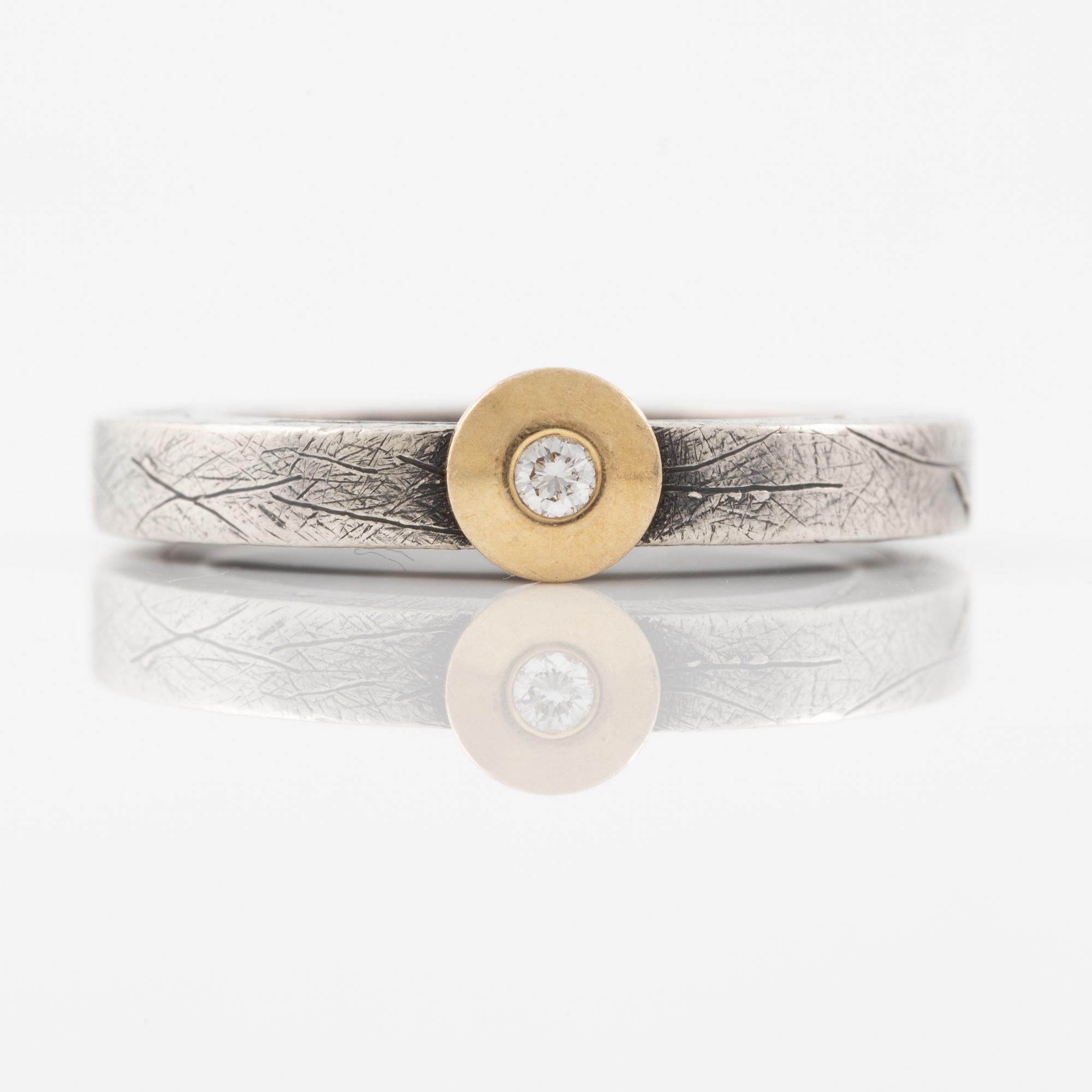 Bracelet, necklace, a pair of earrings, and a ring, Pia Rauff, silver with small diamonds.